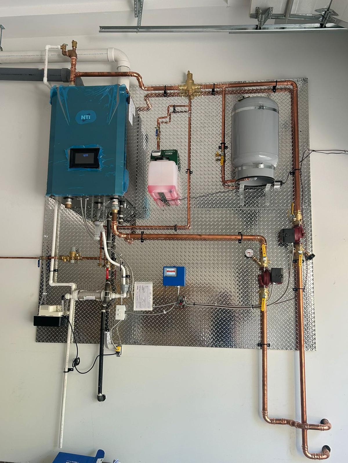 Snow melting hydronics manifold - IKAD Mechanical