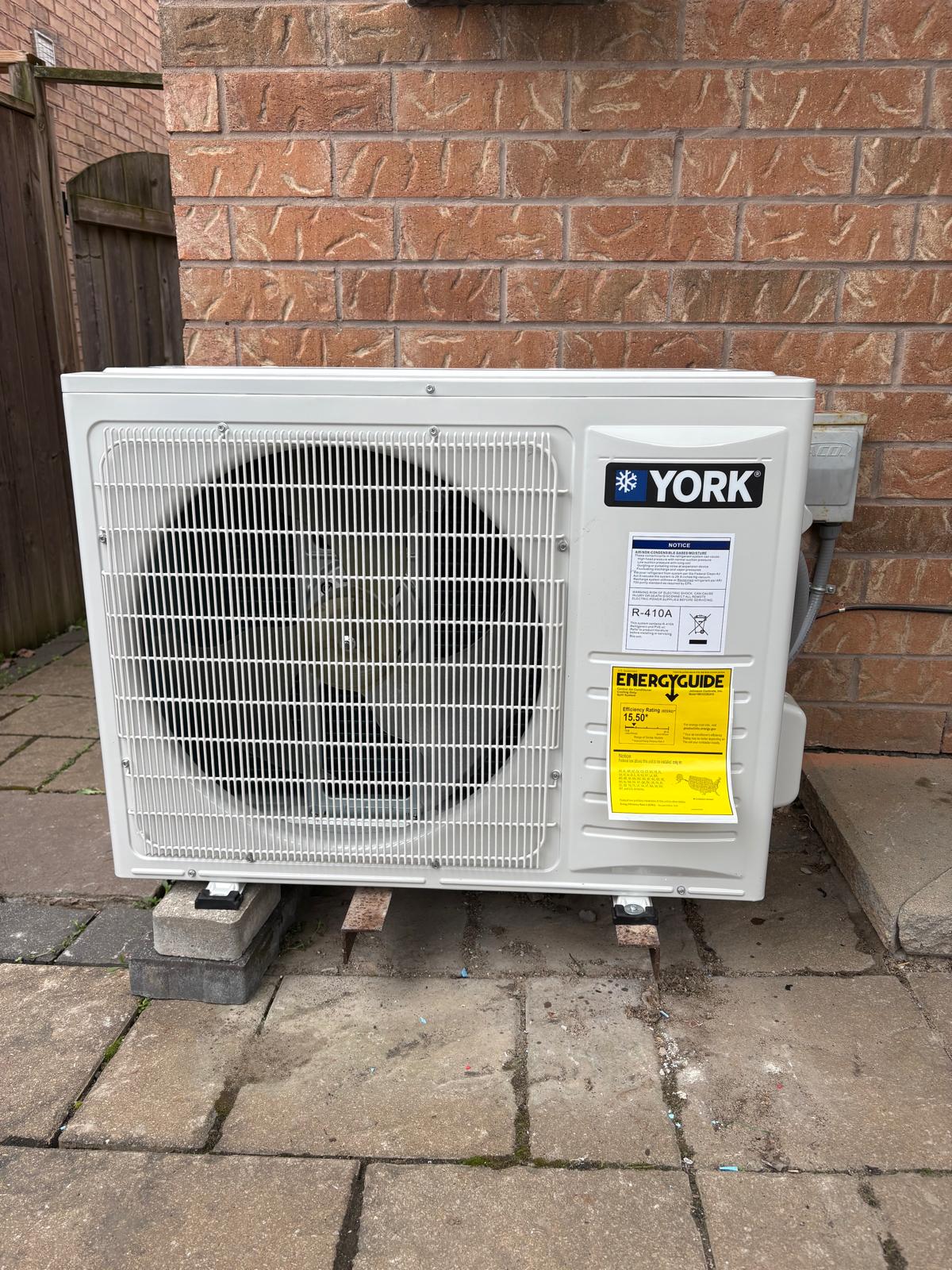 York central AC condenser install in Oakville - IKAD Mechanical