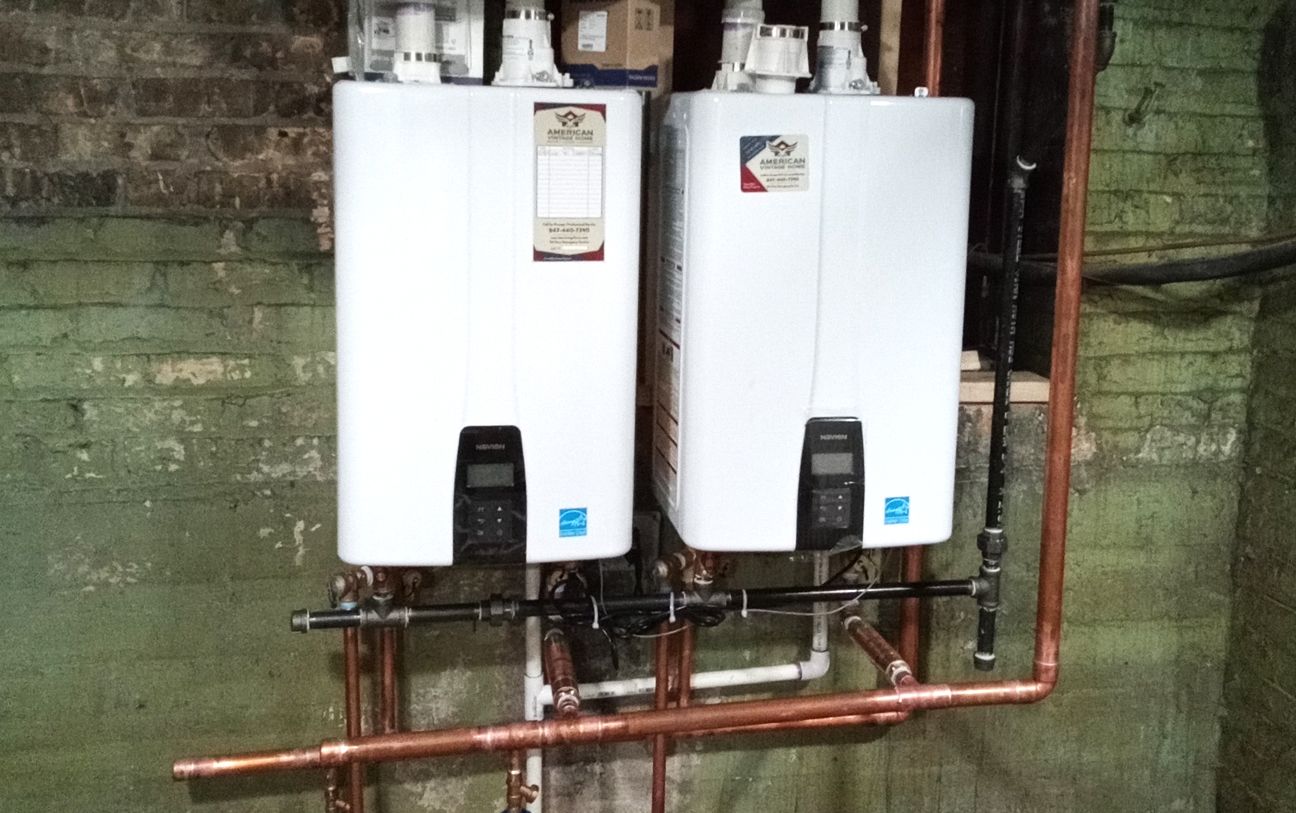 Tankless water heater installation in an Oakville mechanical room